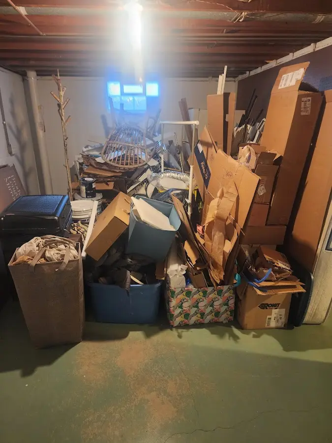 Roll-off dumpster container at job site for Construction Dumpster Rental in West Bradenton